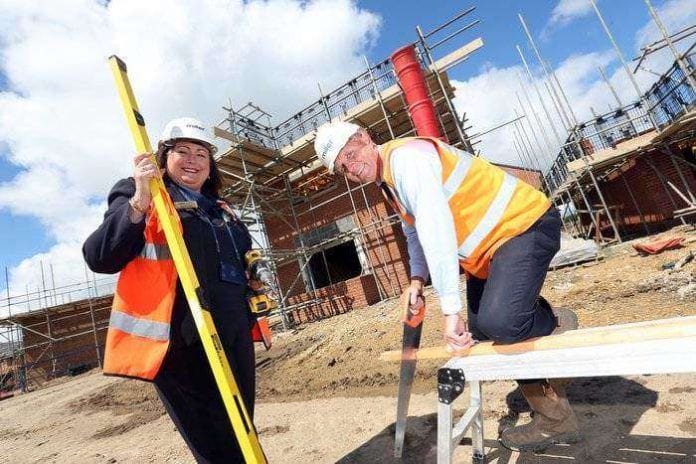 rsz_sales_adviser_brenda_frayne_and_site_manager_john_harrison_at_miller_home_I_love_newcastle_magazine_