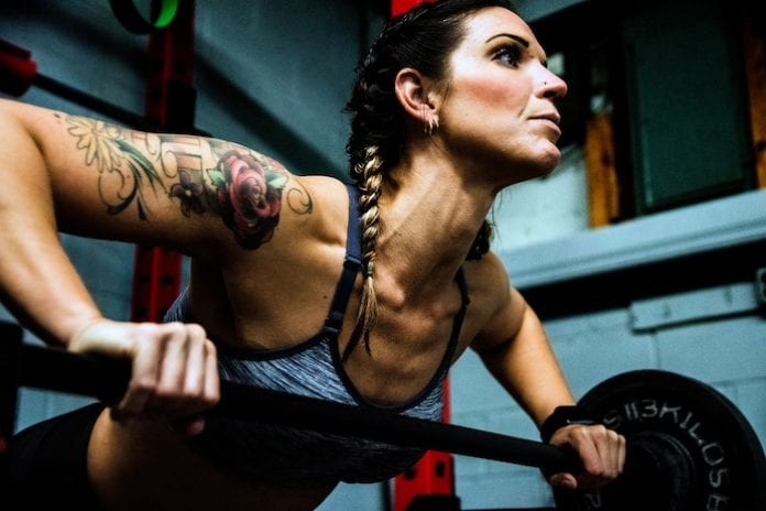 home-workout-woman weights-5089052_1280